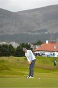 27 May 2015; Rory McIlroy putts on the 10th green. Dubai Duty Free Irish Open Golf Championship 2015, Pro-Am. Royal County Down Golf Club, Co. Down. Picture credit: Ramsey Cardy / SPORTSFILE