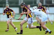 27 May 2015; Peter Sutton, Wexford, in action against Paul Kelly, Kildare. Bord Gais Energy Leinster GAA Hurling U21 Championship, Kildare v Wexford, St Conleth's Park, Newbridge, Co. Kildare. Picture credit: Matt Browne / SPORTSFILE