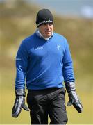 28 May 2015; Paul McGinley, Ireland, wearing handwarmers on the 5th green. Dubai Duty Free Irish Open Golf Championship 2015, Day 1. Royal County Down Golf Club, Co. Down. Picture credit: Brendan Moran / SPORTSFILE