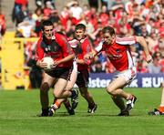 29 June 2008; Dan Gordon, Down, in action against Paul McGrane, Armagh. GAA Football Ulster Senior Championship Semi-Final, Down v Armagh, St Tighearnach's Park, Clones, Co. Monaghan. Picture credit: Oliver McVeigh / SPORTSFILE