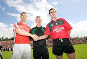 29 June 2008; Referee Joe McQuillan, centre, at the toss with Armagh captain Paul McGrane and Down captain Dan Gordon before the game. GAA Football Ulster Senior Championship Semi-Final, Down v Armagh, St Tighearnach's Park, Clones, Co. Monaghan. Picture credit: Oliver McVeigh / SPORTSFILE