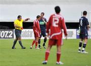 17 July 2008; Referee Ararats Cagarjans red cards JFK Olimps' Andrejs Stolcers for head butting Stephen Paisley while St Patrick's Jamie Harris looks on. UEFA Cup First Qualifying Round, 1st Leg, JFK Olimps v St Patrick's Athletic, Riga, Latvia. Picture credit: John Barrington / SPORTSFILE *** Local Caption *** .