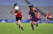 14 July 2008; Megan Clarke, Down, in action against Cassie Bennett, Wexford, during the Coillte Camogie - U14 Development Squads Blitz Day. Over 240 players from Antrim, Carlow, Cavan, Down, Louth, Roscommon, Waterford and Wexford had the once in a lifetime opportunity to play on the hallowed turf of Croke Park. Coillte Camogie - U14 Development Squads Blitz Day, Croke Park, Dublin. Picture credit: Stephen McCarthy / SPORTSFILE