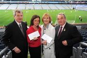 16 July 2008; President of the GAA Nickey Brennan presented cheques to Temple Street Children’s University Hospital and The Hope Foundation. The two organisations were nominated as the Official Charities of the GAA for 2007/08 and the funds were raised by GAA units at all levels. At the presentations are Nickey Brennan, right, Paraic Duffy, Ard Stiúrthoir, left, Denise Fitzgerald, CEO Fundraising Office, Temple Street Children's University Hospital, left, and Madeleine Cummins, Hope Foundation. Croke Park, Dublin. Picture credit: Ray McManus / SPORTSFILE