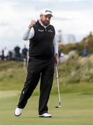 28 May 2015; Shane Lowry, Ireland, reacts after sinking a putt on the 18th. Dubai Duty Free Irish Open Golf Championship 2015, Day 1. Royal County Down Golf Club, Co. Down. Picture credit: John Dickson / SPORTSFILE