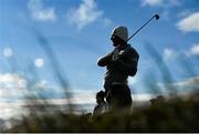 29 May 2015; Padraig Harrington watches his tee shot on the 9th hole. Dubai Duty Free Irish Open Golf Championship 2015, Day 2. Royal County Down Golf Club, Co. Down. Picture credit: Ramsey Cardy / SPORTSFILE