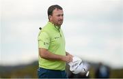 29 May 2015; Graeme McDowell, Northern Ireland, on the 18th green after finishing his round with a 75. Dubai Duty Free Irish Open Golf Championship 2015, Day 2. Royal County Down Golf Club, Co. Down. Picture credit: Brendan Moran / SPORTSFILE