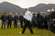 29 May 2015; Rory McIlroy, Northern Ireland, after playing his 2nd shot on the 11th hole. Dubai Duty Free Irish Open Golf Championship 2015, Day 2. Royal County Down Golf Club, Co. Down. Picture credit: Ramsey Cardy / SPORTSFILE