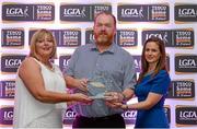 29 May 2015; Armagh's James Daly, TESCO / Irish Daily Star Ladies Football Manager of the Month for May, is presented with his award by Marie Hickey, LGFA President, left, and Lynn Moynihan, Tesco Marketing Manager. TESCO Team of the League, Croke Park, Dublin. Picture credit: Piaras Ó Mídheach / SPORTSFILE