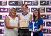 29 May 2015; Yvonne McMonagle, Donegal, centre, is presented with her TESCO Team of the League award for Division 2 by Marie Hickey, LGFA President, left, and Lynn Moynihan, Tesco Marketing Manager. TESCO Team of the League, Croke Park, Dublin. Picture credit: Piaras Ó Mídheach / SPORTSFILE