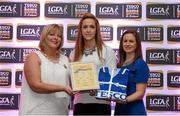 29 May 2015; Caroline O'Hanlon, Armagh, centre, is presented with her TESCO Team of the League award for Division 2 by Marie Hickey, LGFA President, left, and Lynn Moynihan, Tesco Marketing Manager. TESCO Team of the League, Croke Park, Dublin. Picture credit: Piaras Ó Mídheach / SPORTSFILE