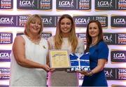 29 May 2015; Niamh Lister, Meath, centre, is presented with her TESCO Team of the League award for Division 2 by Marie Hickey, LGFA President, left, and Lynn Moynihan, Tesco Marketing Manager. TESCO Team of the League, Croke Park, Dublin. Picture credit: Piaras Ó Mídheach / SPORTSFILE