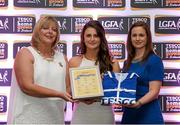 29 May 2015; Emma Troy, Meath, centre, is presented with her TESCO Team of the League award for Division 2 by Marie Hickey, LGFA President, left, and Lynn Moynihan, Tesco Marketing Manager. TESCO Team of the League, Croke Park, Dublin. Picture credit: Piaras Ó Mídheach / SPORTSFILE