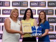29 May 2015; Karen Walsh, Westmeath, centre, is presented with her TESCO Team of the League award for Division 2 by Marie Hickey, LGFA President, left, and Lynn Moynihan, Tesco Marketing Manager. TESCO Team of the League, Croke Park, Dublin. Picture credit: Piaras Ó Mídheach / SPORTSFILE