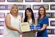 29 May 2015; Linda Wall, Waterford, centre, is presented with her TESCO Team of the League award for Division 3 by Marie Hickey, LGFA President, left, and Lynn Moynihan, Tesco Marketing Manager. TESCO Team of the League, Croke Park, Dublin. Picture credit: Piaras Ó Mídheach / SPORTSFILE