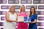 29 May 2015; Tracey Leonard, Galway, centre, is presented with her TESCO Team of the League award for Division 1 by Marie Hickey, LGFA President, left, and Lynn Moynihan, Tesco Marketing Manager. TESCO Team of the League, Croke Park, Dublin. Picture credit: Piaras Ó Mídheach / SPORTSFILE