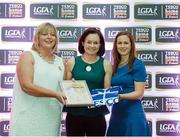 29 May 2015; Sinéad McLaughlin, Antrim, centre, is presented with her TESCO Team of the League award for Division 4 by Marie Hickey, LGFA President, left, and Lynn Moynihan, Tesco Marketing Manager. TESCO Team of the League, Croke Park, Dublin. Picture credit: Piaras Ó Mídheach / SPORTSFILE