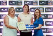 29 May 2015; Jackie Kinch, Wicklow, centre, is presented with her TESCO Team of the League award for Division 4 by Marie Hickey, LGFA President, left, and Lynn Moynihan, Tesco Marketing Manager. TESCO Team of the League, Croke Park, Dublin. Picture credit: Piaras Ó Mídheach / SPORTSFILE