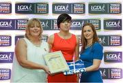 29 May 2015; Paula Murray, Louth, is presented with her TESCO Team of the League award for Division 4 by Marie Hickey, LGFA President, left, and Lynn Moynihan, Tesco Marketing Manager. TESCO Team of the League, Croke Park, Dublin. Picture credit: Piaras Ó Mídheach / SPORTSFILE