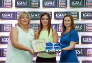 29 May 2015; Catherine McCloskey, Derry, centre, is presented with her TESCO Team of the League award for Division 4 by Marie Hickey, LGFA President, left, and Lynn Moynihan, Tesco Marketing Manager. TESCO Team of the League, Croke Park, Dublin. Picture credit: Piaras Ó Mídheach / SPORTSFILE