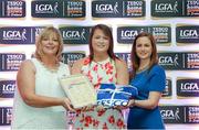29 May 2015; Gillian Dufficy, Roscommon, centre, is presented with her TESCO Team of the League award for Division 3 by Marie Hickey, LGFA President, left, and Lynn Moynihan, Tesco Marketing Manager. TESCO Team of the League, Croke Park, Dublin. Picture credit: Piaras Ó Mídheach / SPORTSFILE