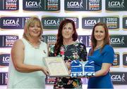 29 May 2015; Jacqui Mulligan, Sligo, centre, is presented with her TESCO Team of the League award for Division 3 by Marie Hickey, LGFA President, left, and Lynn Moynihan, Tesco Marketing Manager. TESCO Team of the League, Croke Park, Dublin. Picture credit: Piaras Ó Mídheach / SPORTSFILE