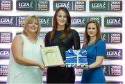 29 May 2015; Jenny Higgins, Roscommon, centre, is presented with her TESCO Team of the League award for Division 3 by Marie Hickey, LGFA President, left, and Lynn Moynihan, Tesco Marketing Manager. TESCO Team of the League, Croke Park, Dublin. Picture credit: Piaras Ó Mídheach / SPORTSFILE