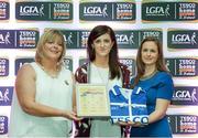 29 May 2015; Emer Flaherty, Galway, centre, is presented with her TESCO Team of the League award for Division 1 by Marie Hickey, LGFA President, left, and Lynn Moynihan, Tesco Marketing Manager. TESCO Team of the League, Croke Park, Dublin. Picture credit: Piaras Ó Mídheach / SPORTSFILE
