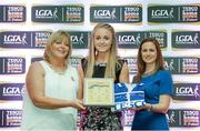 29 May 2015; Neamh Woods, Tyrone, centre, is presented with her TESCO Team of the League award for Division 1 by Marie Hickey, LGFA President, left, and Lynn Moynihan, Tesco Marketing Manager. TESCO Team of the League, Croke Park, Dublin. Picture credit: Piaras Ó Mídheach / SPORTSFILE