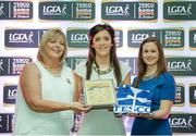 29 May 2015; Ciara O'Sullivan, Cork, centre, is presented with her TESCO Team of the League award for Division 1 by Marie Hickey, LGFA President, left, and Lynn Moynihan, Tesco Marketing Manager. TESCO Team of the League, Croke Park, Dublin. Picture credit: Piaras Ó Mídheach / SPORTSFILE