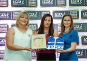 29 May 2015; Patrice Dennehy, Kerry, centre, is presented with her TESCO Team of the League award for Division 1 by Marie Hickey, LGFA President, left, and Lynn Moynihan, Tesco Marketing Manager. TESCO Team of the League, Croke Park, Dublin. Picture credit: Piaras Ó Mídheach / SPORTSFILE