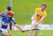 19 July 2008; Karl Stewart, Antrim, in action against Michael McEvoy, Laois. GAA Hurling All-Ireland Senior Championship Relegation Play-off, Antrim v Laois, Pairc Tailteann, Navan, Co. Meath. Picture credit: Brian Lawless / SPORTSFILE