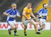 19 July 2008; Paddy Richmond, Antrim, in action against Darren Maher, Laois. GAA Hurling All-Ireland Senior Championship Relegation Play-off, Antrim v Laois, Pairc Tailteann, Navan, Co. Meath. Picture credit: Brian Lawless / SPORTSFILE