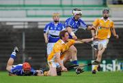 19 July 2008; Karl Stewart, Antrim, in action against Michael McEvoy, left, and Canice Coonan, Laois. GAA Hurling All-Ireland Senior Championship Relegation Play-off, Antrim v Laois, Pairc Tailteann, Navan, Co. Meath. Picture credit: Brian Lawless / SPORTSFILE