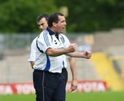 19 July 2008; Monaghan manager, Seamus McEnaney, celebrates his sides winning points. GAA Football All-Ireland Senior Championship Qualifier - Round 1, Monaghan v Derry. Clones, Co. Monaghan. Picture credit: Oliver McVeigh / SPORTSFILE
