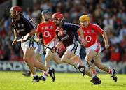 19 July 2008; Ollie Canning, the Galway captain, races clear of Joe Deane, Cork. All-Ireland Senior Championship Qualifier - Round 4, Cork v Galway, Thurles, Co. Tipperary. Picture credit: Ray McManus / SPORTSFILE