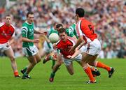 20 July 2008; Finnian Moriarty, Armagh, in action against Mark Little, Fermanagh. GAA Football Ulster Senior Championship Final, Armagh v Fermanagh, St Tighearnach's Park, Clones, Co. Monaghan. Picture credit: Oliver McVeigh / SPORTSFILE