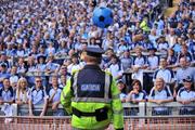 20 July 2008; A member of Garda Síochána kicks a ball into Hill 16. GAA Football Leinster Senior Championship Final, Dublin v Wexford, Croke Park, Dublin. Picture credit: David Maher / SPORTSFILE
