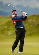 30 May 2015; Bradley Dredge, Wales, watches his second shot to the 2nd green. Dubai Duty Free Irish Open Golf Championship 2015, Day 3. Royal County Down Golf Club, Co. Down. Picture credit: Oliver McVeigh / SPORTSFILE