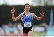 30 May 2015; Hope Saunders, Mount Temple CS, Dublin, wins the Girls 3000 metre senior competition.  GloHealth Irish Schools' Track and Field Championships. Tullamore, Co. Offaly. Picture credit: Seb Daly / SPORTSFILE
