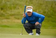 30 May 2015; Soren Kjeldsen, Denmark, having a look at his line for his putt on the18th Green. Dubai Duty Free Irish Open Golf Championship 2015, Day 3. Royal County Down Golf Club, Co. Down. Picture credit: Oliver McVeigh / SPORTSFILE