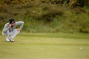 30 May 2015; Maximilian Kieffer, Germany, lines up a putt on the 16th green. Dubai Duty Free Irish Open Golf Championship 2015, Day 3. Royal County Down Golf Club, Co. Down. Picture credit: Brendan Moran / SPORTSFILE