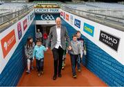 30 May 2015; Derry great Anthony Tohill leads Fionn Davey, left, aged 6, from Barrow, Wexford, and Riain O'Kane, aged 9, from Swatragh, Derry, out of the Hogan Stand tunnel during today’s Bord Gáis Energy Legends Tour at Croke Park where he relived some of most memorable moments from his playing and managerial career. All Bord Gáis Energy Legends Tours include a trip to the GAA Museum, which is home to many exclusive exhibits, including the official GAA Hall of Fame. For booking and ticket information about the GAA legends for this summer’s tours visit www.crokepark.ie/gaa-museum. Croke Park, Dublin. Picture credit: Piaras Ó Mídheach / SPORTSFILE