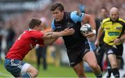 30 May 2015; DTH van der Merwe, Glasgow Warriors, fends off Ian Keatley, Munster, on his way to scoring his side's second try of the game. Guinness PRO12 Final, Munster v Glasgow Warriors. Kingspan Stadium, Ravenhill Park, Belfast. Picture credit: John Dickson / SPORTSFILE