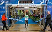 31 May 2015; Freddy Sittuk, Kenya, crossing the finish line of the SSE Airtricity Derry Marathon. Guildhall Square, Derry. Picture credit: Oliver McVeigh / SPORTSFILE