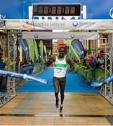 31 May 2015; Freddy Sittuk, Kenya, crossing the finish line of the SSE Airtricity Derry Marathon. Guildhall Square, Derry. Picture credit: Oliver McVeigh / SPORTSFILE