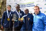 31 May 2015; Pictured, from left, are Greg Robert, Derry, 3rd place, Freddy Sittuk, Kenya, winner, Peter Somba, Kenya, runner up, along with Peter Cunningham, SSE Airtricity, after the SSE Airtricity Derry Marathon. Guildhall Square, Derry. Picture credit: Oliver McVeigh / SPORTSFILE