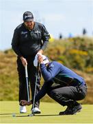 31 May 2015; Seve Benson, England, calls Shane Lowry, Ireland, over to look at his ball, which was moved by the wind on the 8th green. Dubai Duty Free Irish Open Golf Championship 2015, Final Day. Royal County Down Golf Club, Co. Down. Picture credit: John Dickson / SPORTSFILE
