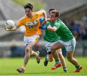 31 May 2015; Conor Small, Antrim, in action against Rory McCaffrey, Fermanagh. Electric Ireland Ulster GAA Football Minor Championship, Quarter-Final, Fermanagh v Antrim, Brewster Park, Enniskillen, Co. Fermanagh. Picture credit: Ramsey Cardy / SPORTSFILE