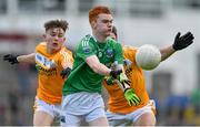 31 May 2015; Niall Clarke, Fermanagh, in action against Eamon Fyfe, left, and Darren McCormick, Antrim. Electric Ireland Ulster GAA Football Minor Championship, Quarter-Final, Fermanagh v Antrim, Brewster Park, Enniskillen, Co. Fermanagh. Picture credit: Ramsey Cardy / SPORTSFILE